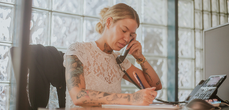 Decorative cartoonized image of flowers with a Toronto city background.